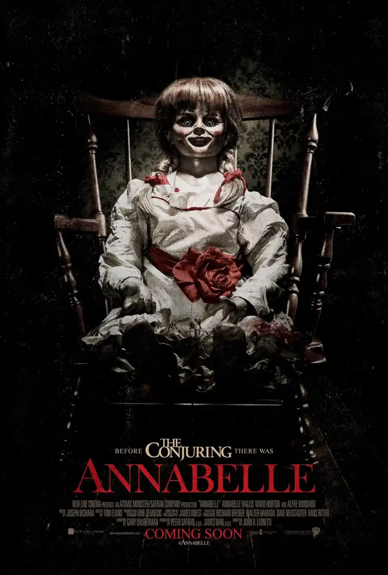 Annabelle Horror Movie poster featuring the terrifying demonic doll seated in a wooden rocking chair against a dark, distressed background.