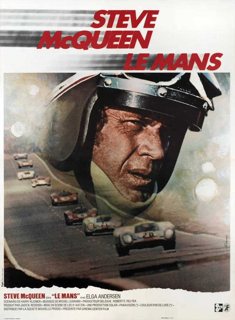 Le Mans Movie poster featuring a close-up of Steve McQueen in his racing helmet with multiple race cars speeding on the track behind him.