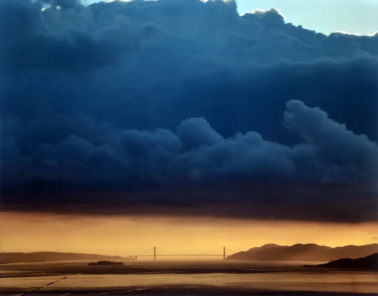 Richard Misrach Fine Art poster featuring the Golden Gate Bridge and San Francisco Bay under dramatic indigo storm clouds and golden light.