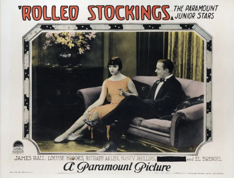 Rolled Stockings 1927 Silent Film poster featuring Louise Brooks and James Hall sitting together on a vintage sofa in a classic lobby card style.