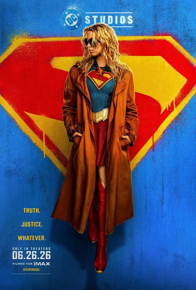 Supergirl DC Movie poster featuring Kara Zor-El in a trench coat against a vibrant, spray-painted Kryptonian 'S' shield on a blue background.