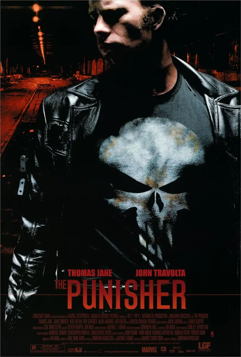 The Punisher Movie poster featuring Thomas Jane (Frank Castle) wearing the iconic skull logo shirt, set against a dark, red-lit urban background.