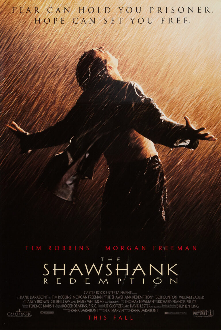 The Shawshank Redemption Movie poster featuring Andy Dufresne standing in the dark rain with arms outstretched symbolizing freedom and hope.