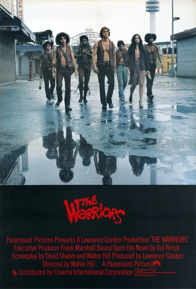 The Warriors Movie poster featuring the gang walking on a wet street with reflections, famous scene from the 1979 Walter Hill film.