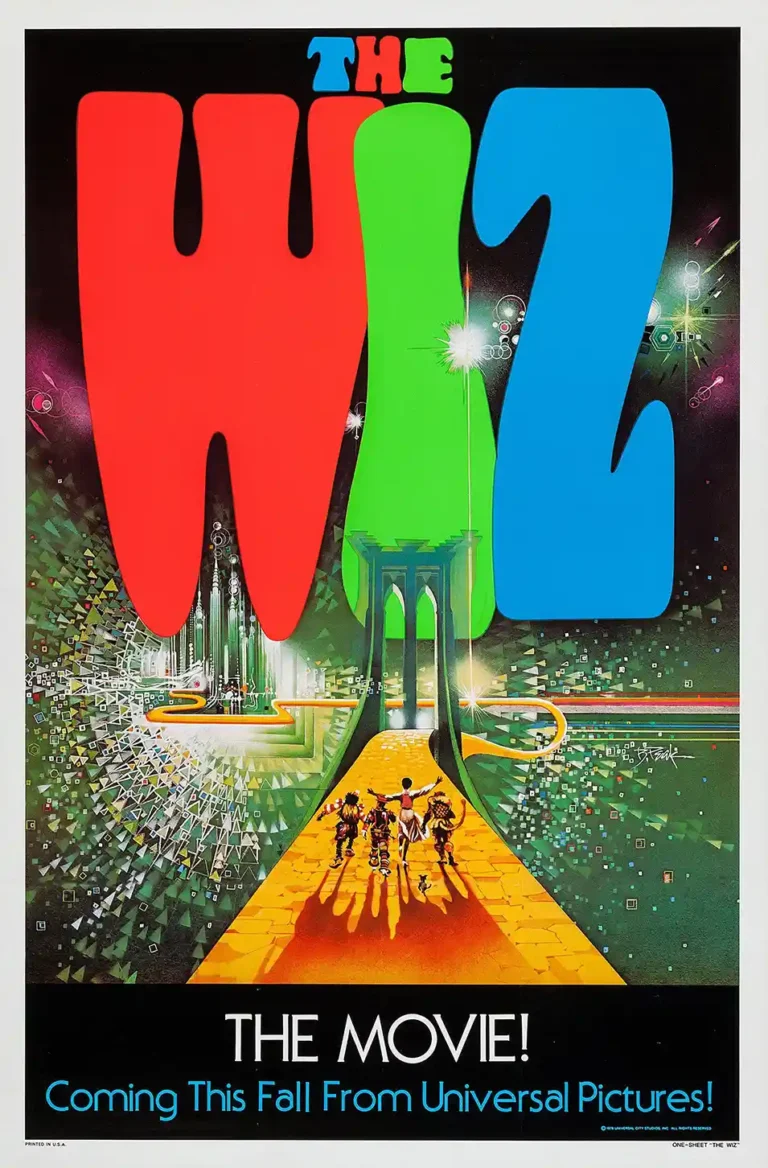 The Wiz 1978 Movie Poster featuring oversized red, green, and blue typography above the characters walking the yellow brick road toward a dazzling city.