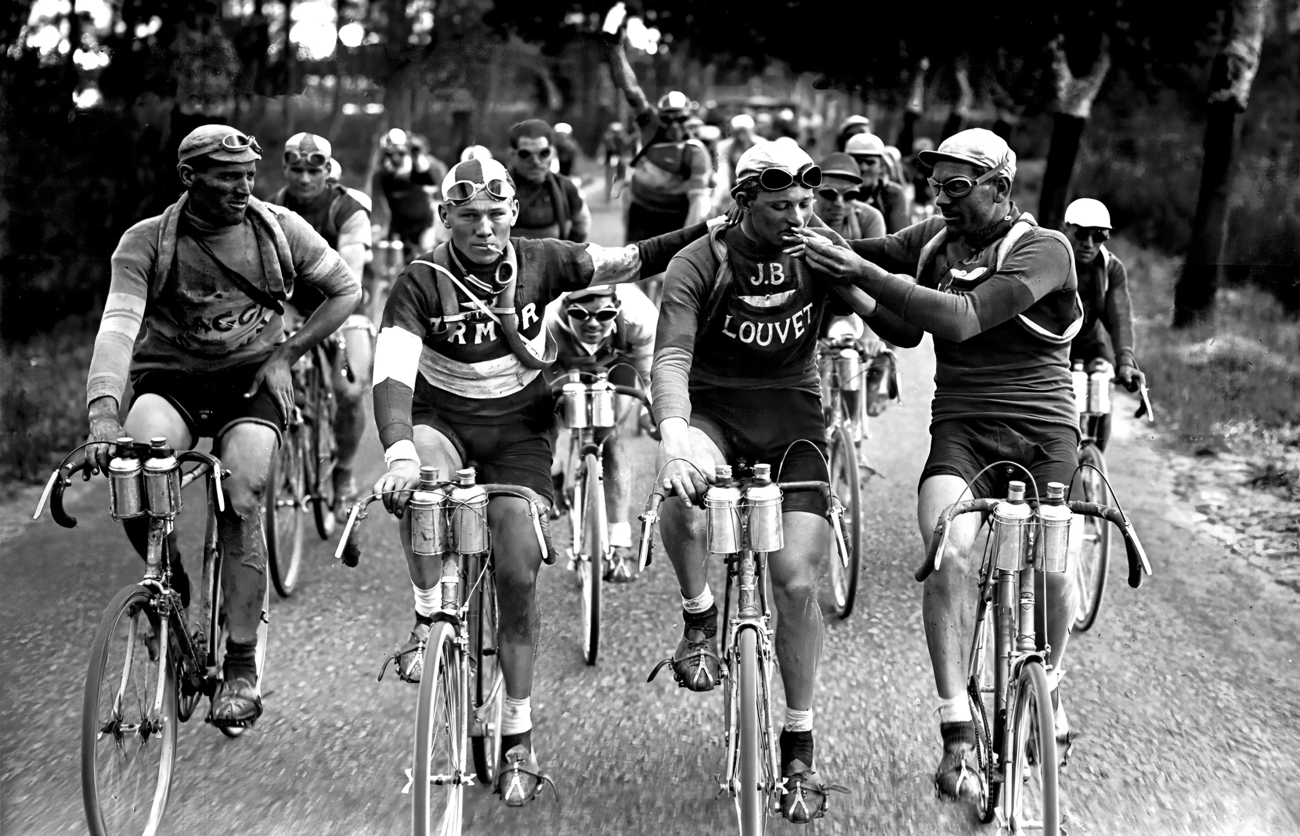 Tour de France cycling print — vintage black and white photography of a Tour de France cyclist smoking a cigarette, early twentieth-century documentary sports photography wall art