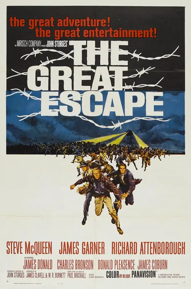The Great Escape Movie Poster featuring Steve McQueen and the ensemble cast running beneath barbed wire and searchlights.