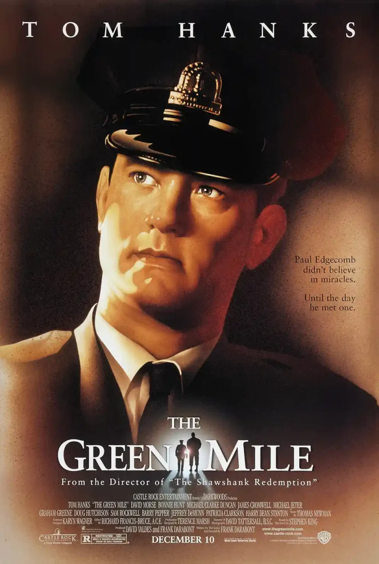 The Green Mile Movie poster featuring a dramatic close-up of Tom Hanks as Paul Edgecomb in his correctional officer uniform.