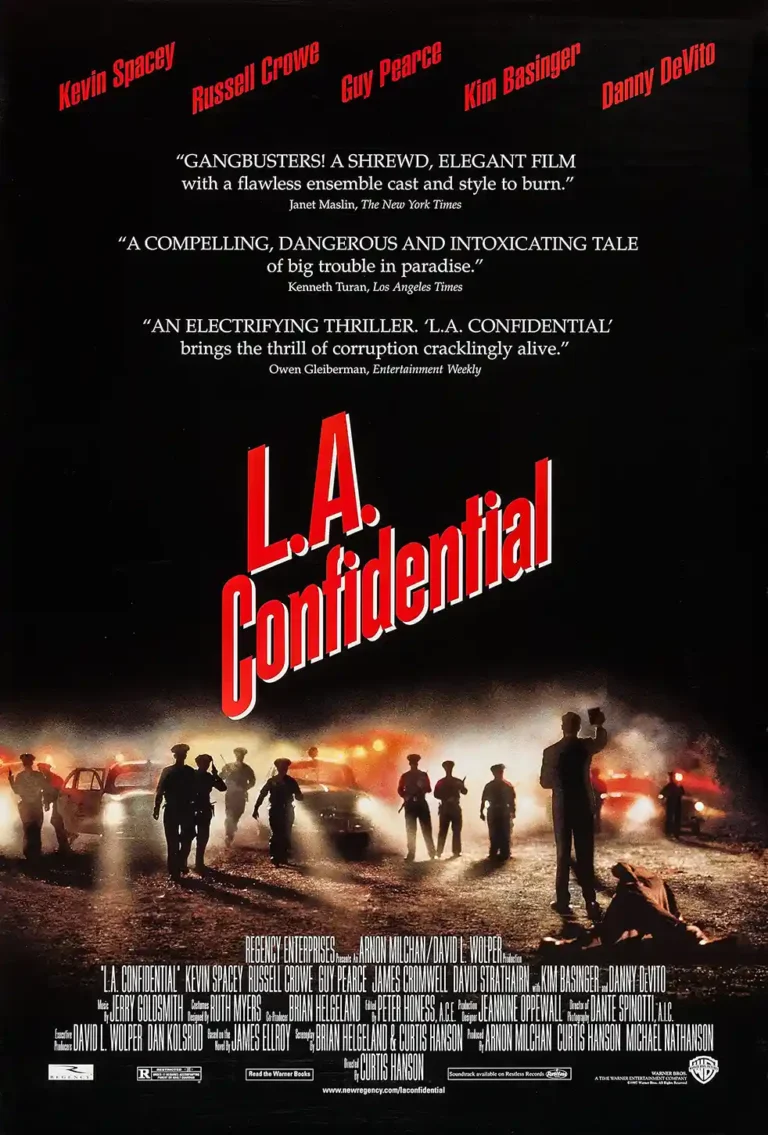 L.A. Confidential Movie poster featuring police officers at a nighttime crime scene with intense vehicle lights and bold red and white title typography.