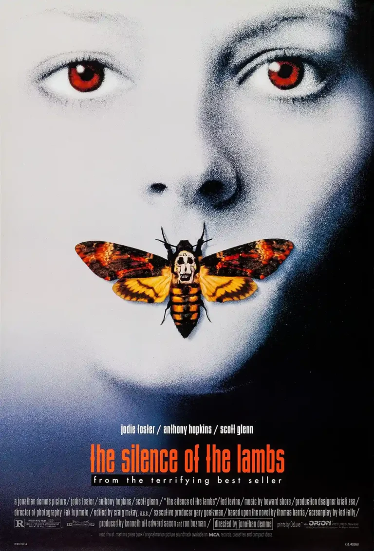 The Silence of the Lambs Movie Poster featuring a close-up face with red eyes and the iconic Death's-head Hawkmoth placed over the mouth.