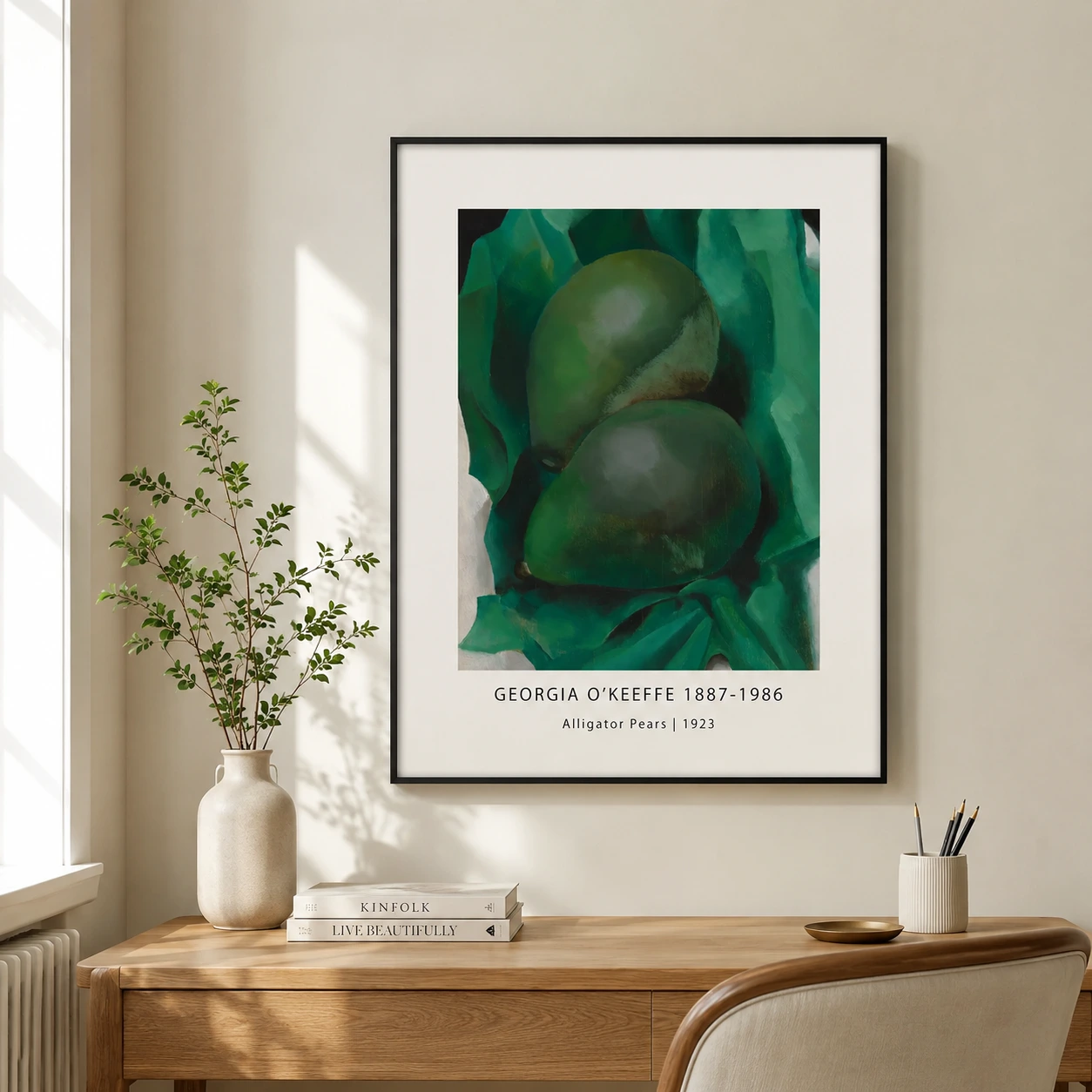 Room mockup of Alligator Pears Poster, Georgia O'Keeffe Green Fruit Art, displayed as framed wall art in a living room setting as a portrait print with green tones.