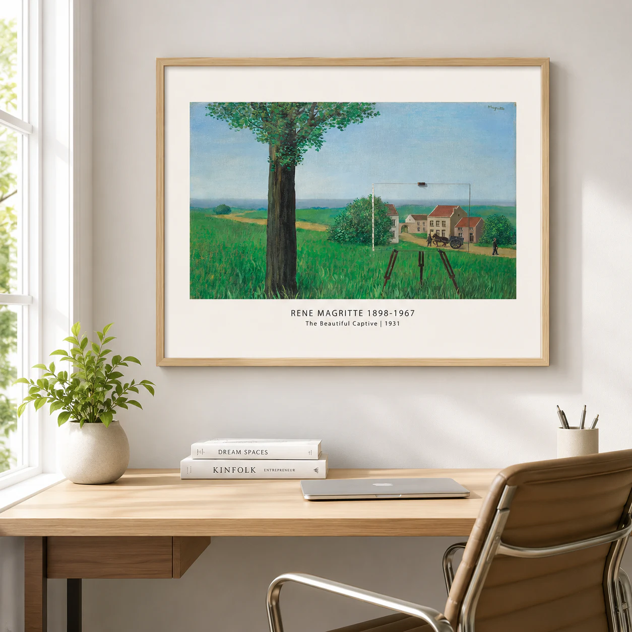 Room mockup of Beautiful Captive Print, Magritte Landscape Wall Art Print, displayed as framed wall art in a living room setting as a landscape print with blue and green tones.