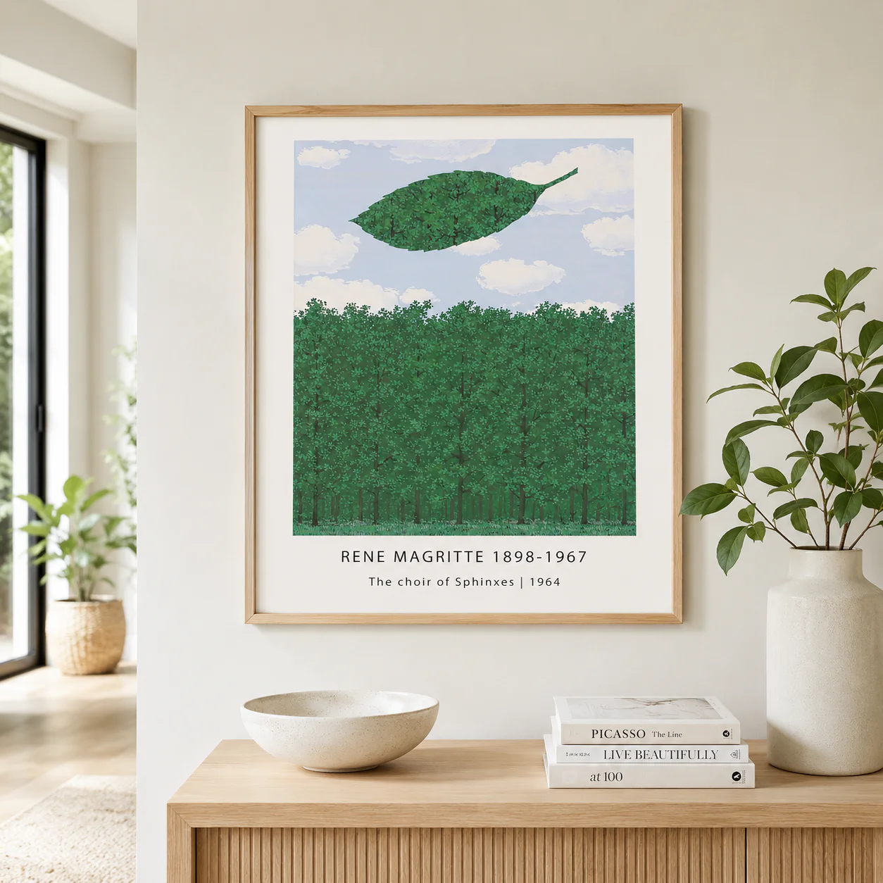 Room mockup of Choir of Sphinxes Print, Floating Leaf Forest Wall Art Print, displayed as framed wall art in a bedroom setting as a portrait print with green tones.