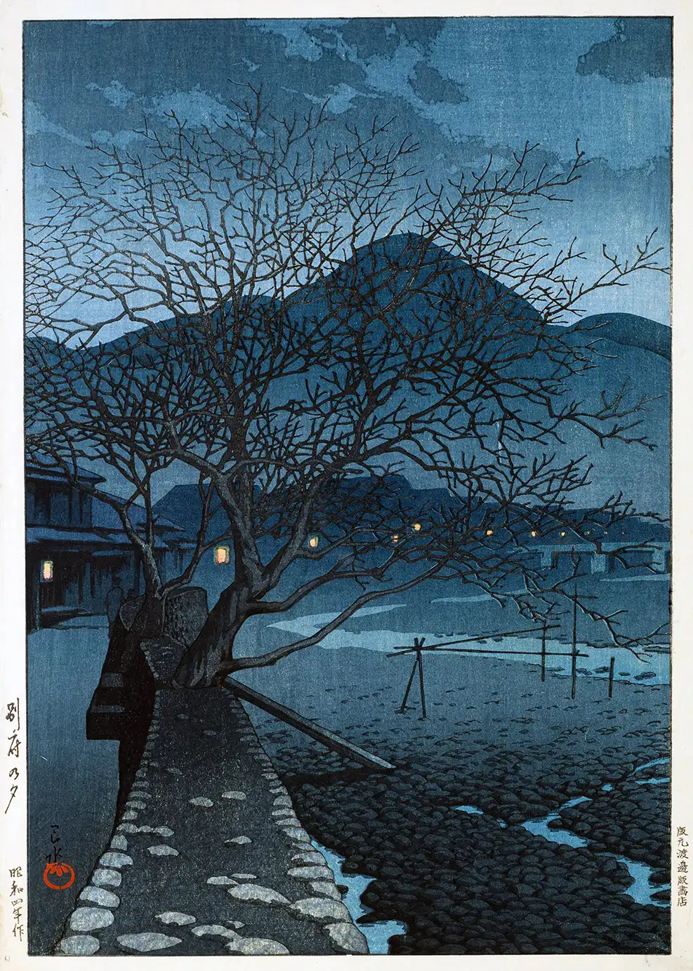 Hasui Kawase print of Evening in Beppu 1929 featuring a silhouette tree and mountain under a blue night sky.