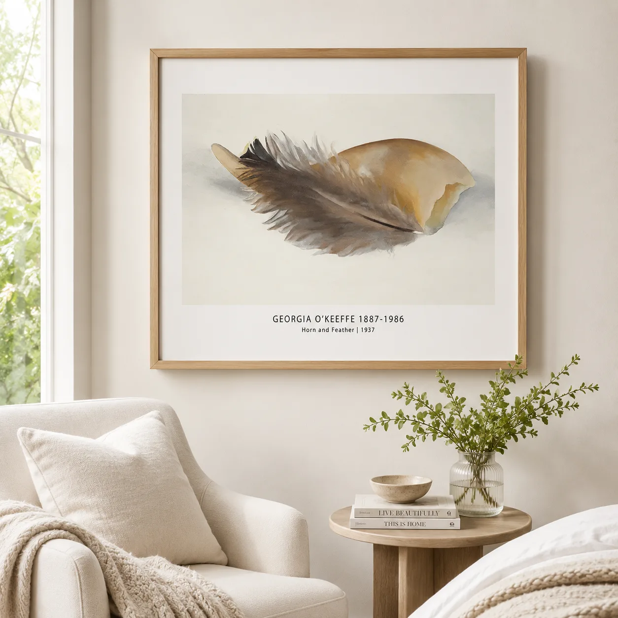 Room mockup of Horn and Feather Print, Georgia O'Keeffe Minimal Bone Art, displayed as framed wall art in a living room setting as a landscape print with orange and brown tones.