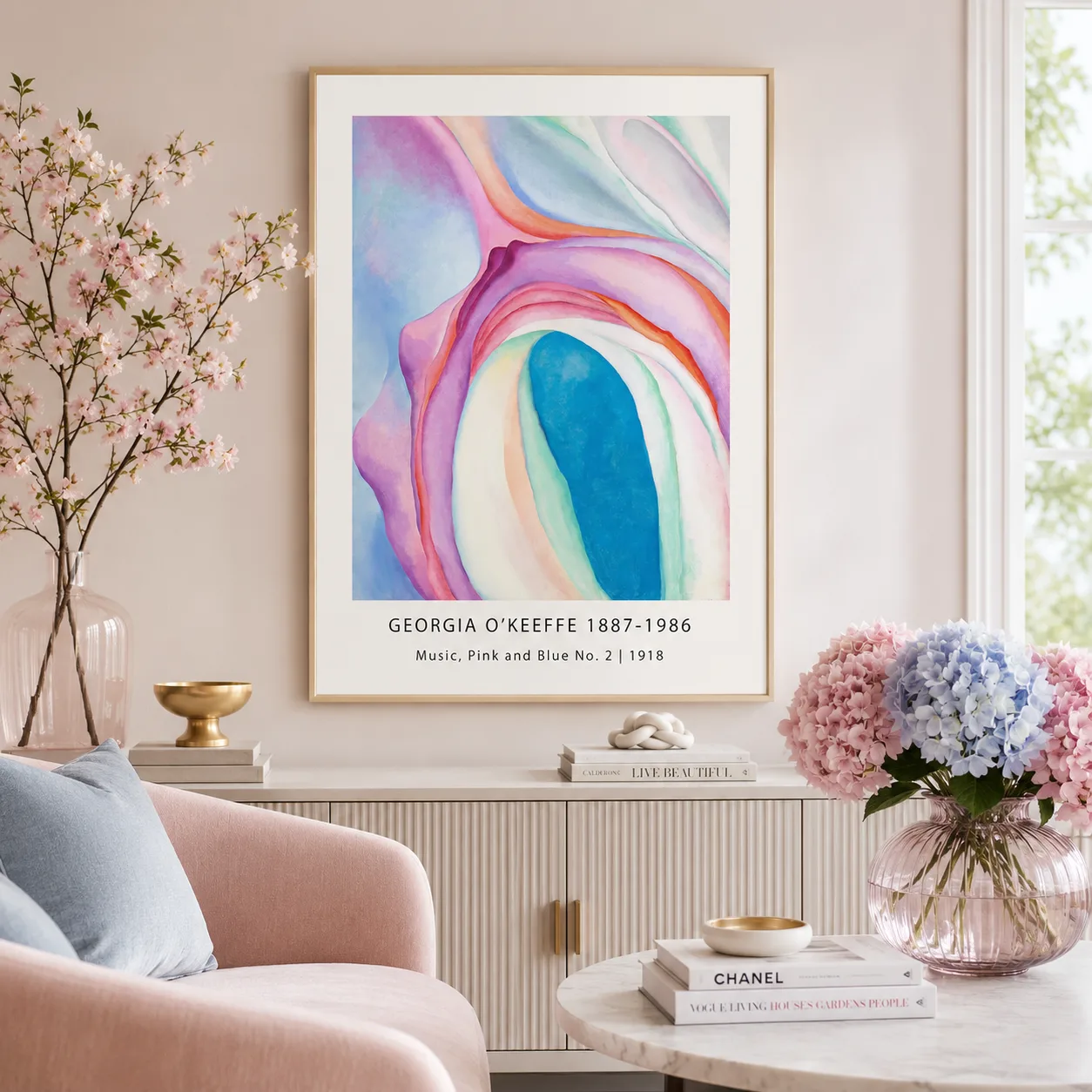 Room mockup of Music Pink Blue Print, Georgia O'Keeffe No. 2, displayed as framed wall art in a living room setting as a portrait print with blue, green, and orange tones.