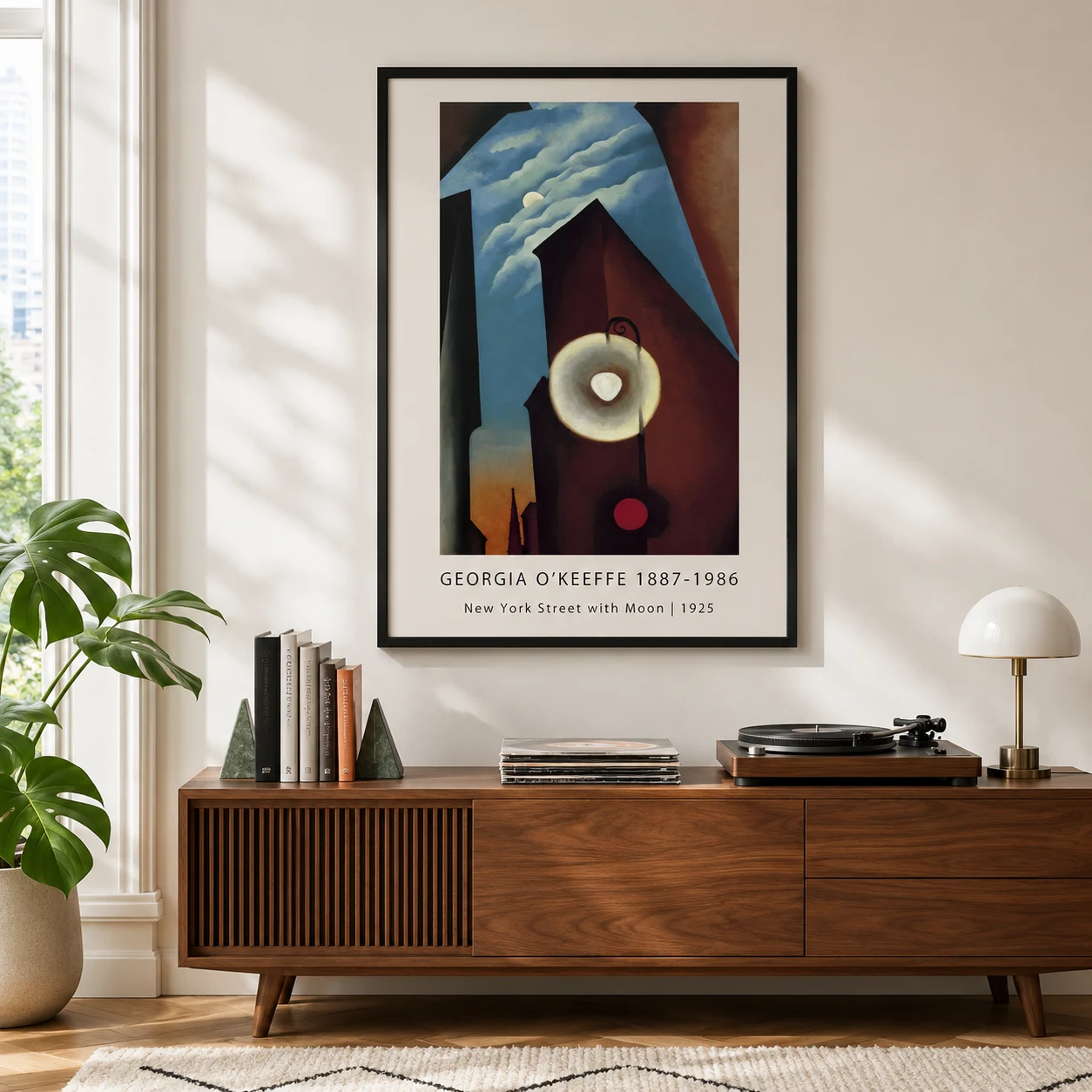 Room mockup of New York Street Print, Georgia O'Keeffe Moonlit City Art, displayed as framed wall art in a living room setting as a portrait print with red and black tones.