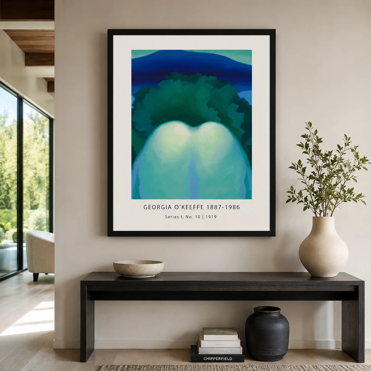 Room mockup of Series I No. 10 Print, Georgia O'Keeffe cool Abstract, displayed as framed wall art in a living room setting as a portrait print with blue, teal, and green tones.