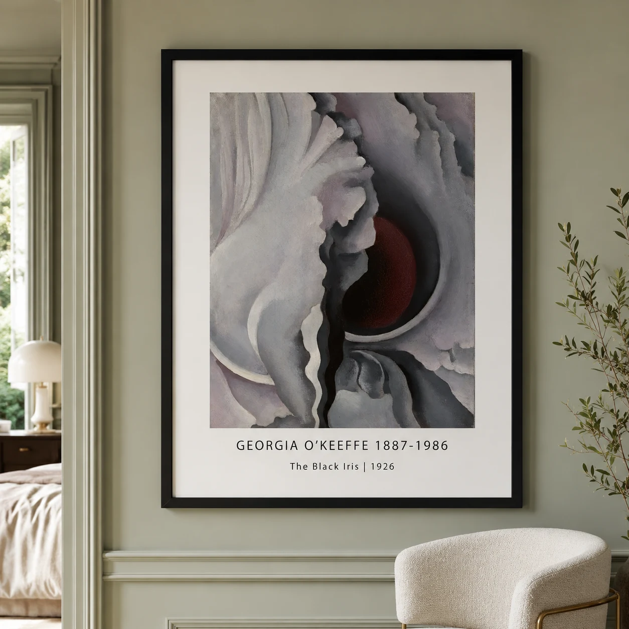 Room mockup of Black Iris Print, Georgia O'Keeffe Modern Floral Wall Art Print, displayed as framed wall art in a bedroom setting as a portrait print with purple, brown, and black tones.