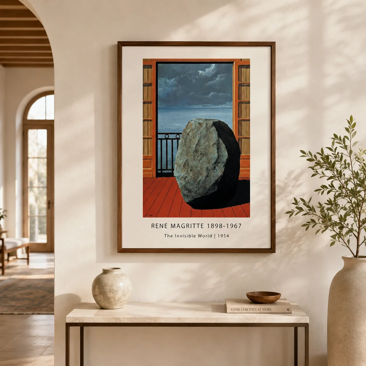 Room mockup of Invisible World Print, Magritte Boulder Balcony Wall Art Print, displayed as framed wall art in a living room setting as a portrait print with blue and grey tones.