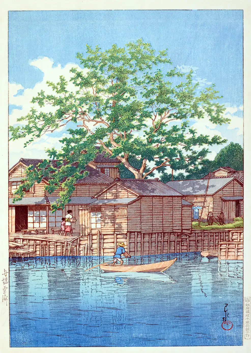 Classic Hasui Woodblock Print: Kuri Ferry At Funabori 1932 Art Hasui Woodblock Print Of A Boatman At Kuri Ferry Funabori With Wooden Houses On Stilts And A Large Green Leafy Tree.