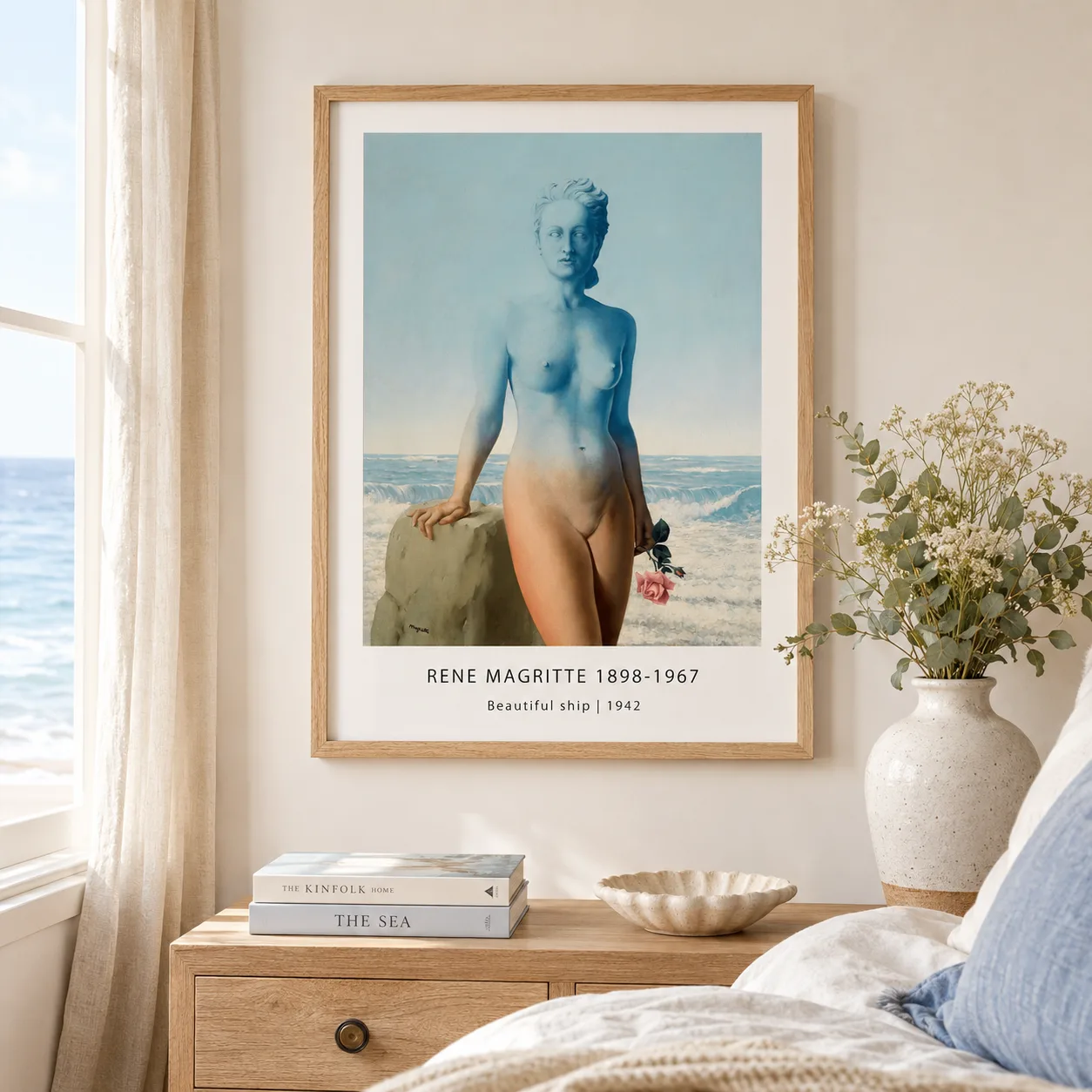 Room mockup of Le Beau Navire Print, Blue Figure Surreal Portrait Art, displayed as framed wall art in a living room setting as a portrait print with blue, pink, and white tones.