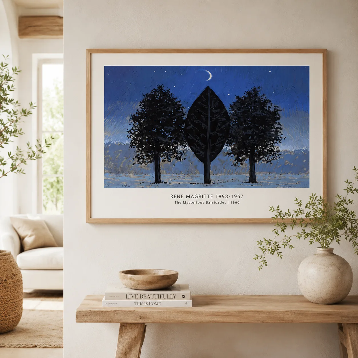 Room mockup of Magritte Barricades Print, Moonlit Tree Surreal Wall Art Print, displayed as framed wall art in a bedroom setting as a landscape print with blue tones.