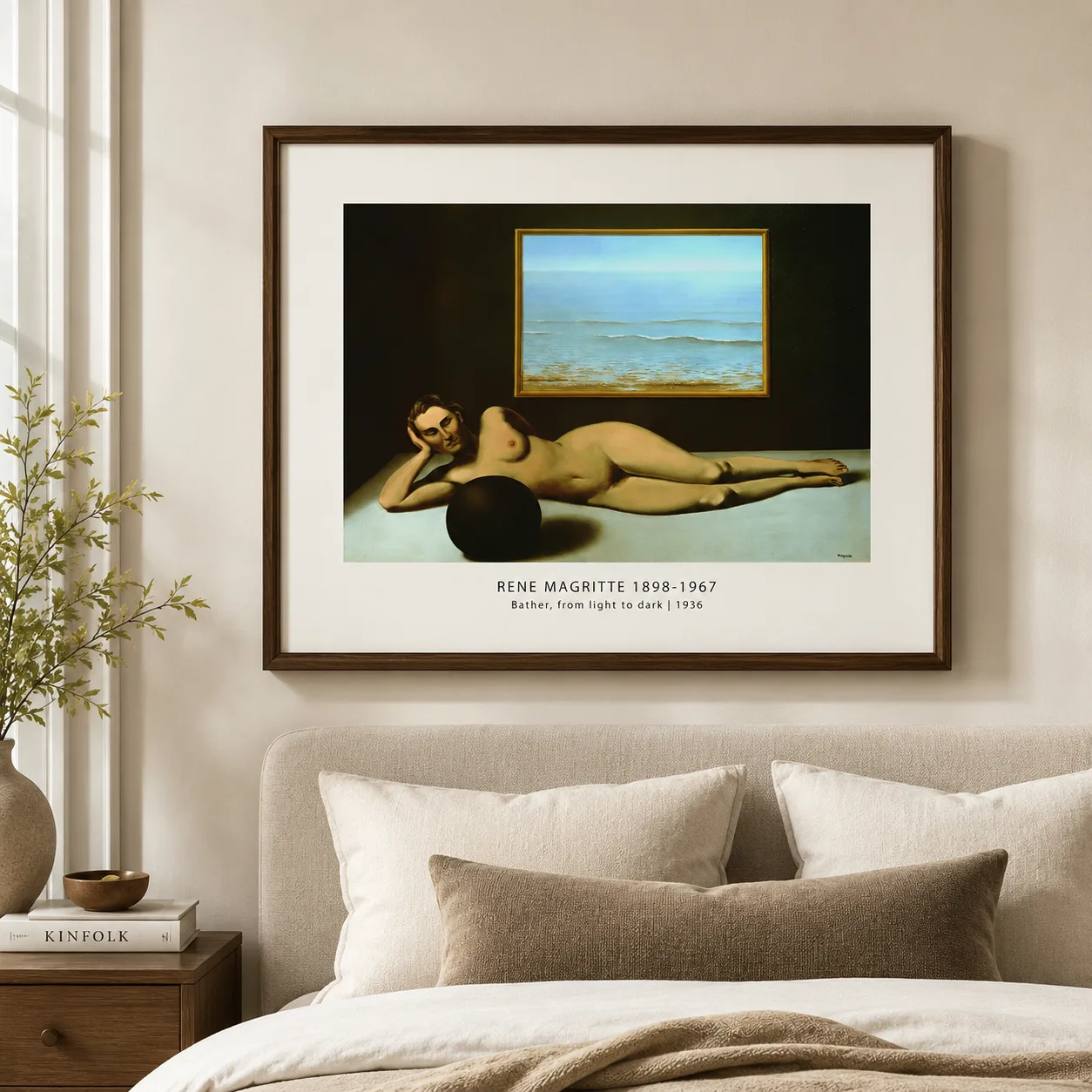Room mockup of Magritte Bather Print, Light and Darkness Figure Art, displayed as framed wall art in a living room setting as a landscape print with black tones.