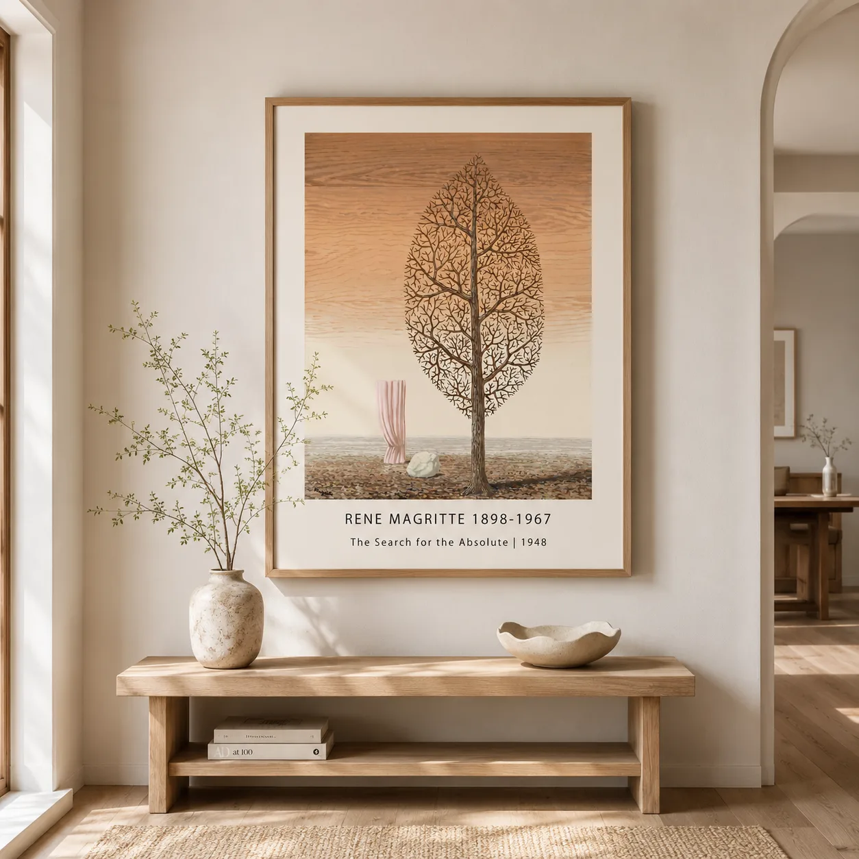 Room mockup of Magritte Landscape Poster, Search for Absolute 1948 Art, displayed as framed wall art in a living room setting as a portrait print with pink tones.