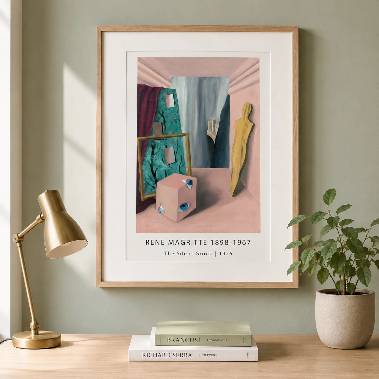 Room mockup of Magritte Silent Group Print, Surreal Pink Room Wall Art Print, displayed as framed wall art in a living room setting as a portrait print with blue and pink tones.