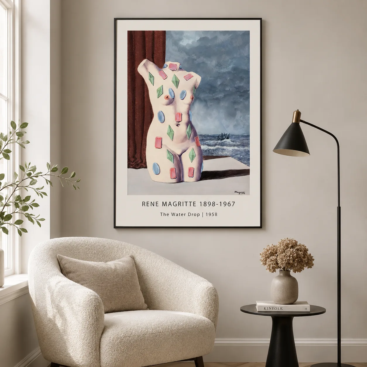 Room mockup of Magritte Torso Print, The Water Drop Surreal Wall Art Print, displayed as framed wall art in a living room setting as a portrait print with blue and red tones.