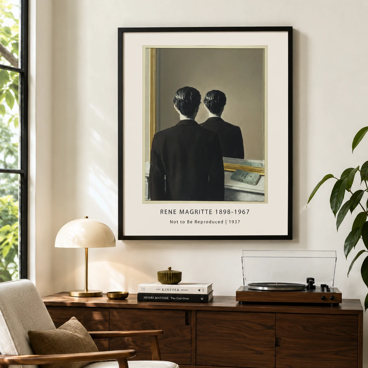 Room mockup of Magritte mirror Print, Not to Be Reproduced Wall Art Print, displayed as framed wall art in a living room setting as a portrait print with blue tones.