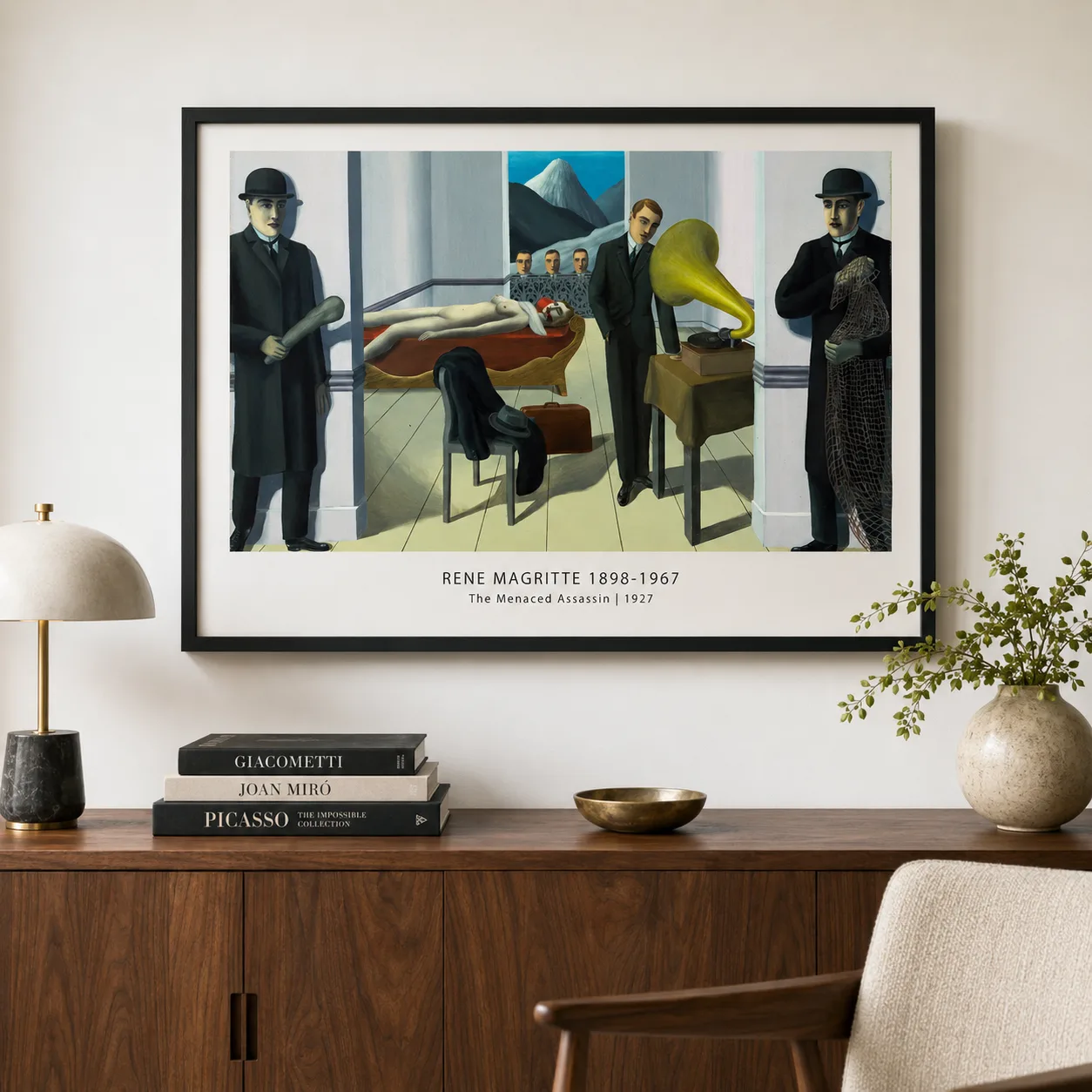 Room mockup of Menaced Assassin Print, Rene Magritte Crime Scene Art, displayed as framed wall art in a living room setting as a landscape print.