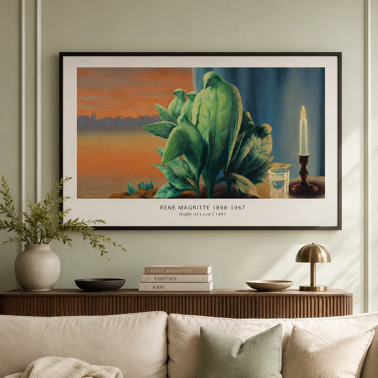 Room mockup of Night of Love Print, Magritte Leaf-Bird Surrealist Art, displayed as framed wall art in a bedroom setting as a landscape print with blue and green tones.