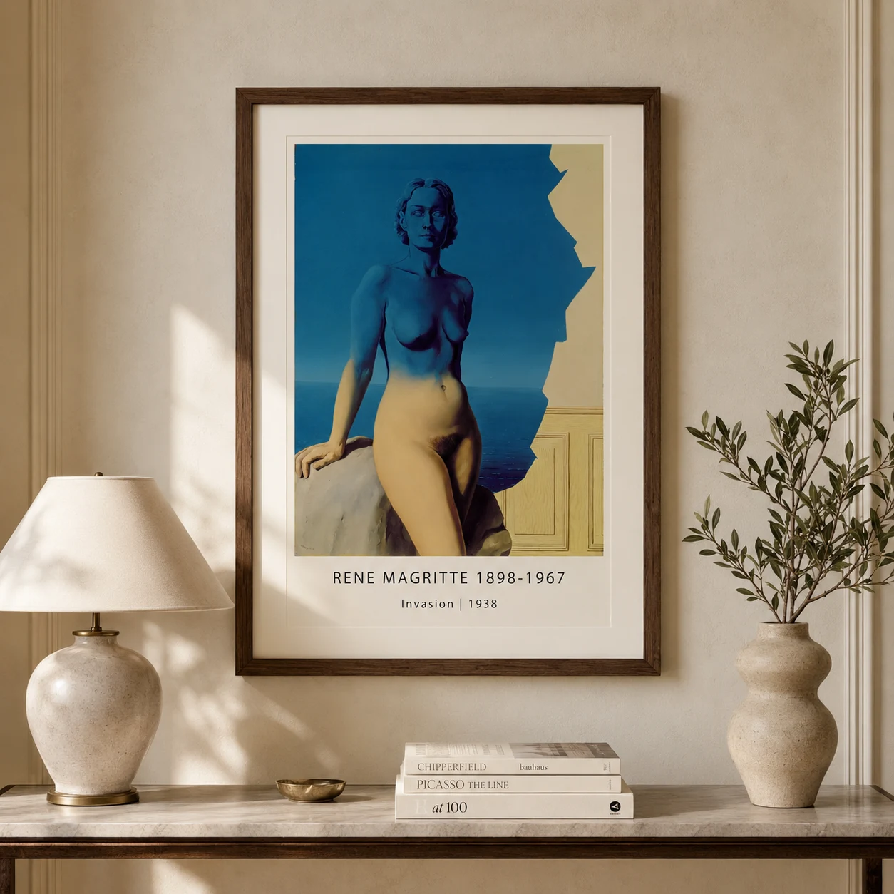 Room mockup of René Magritte Invasion Art Print, Blue Yellow Figure Art, displayed as framed wall art in a living room setting as a portrait print with blue and yellow tones.