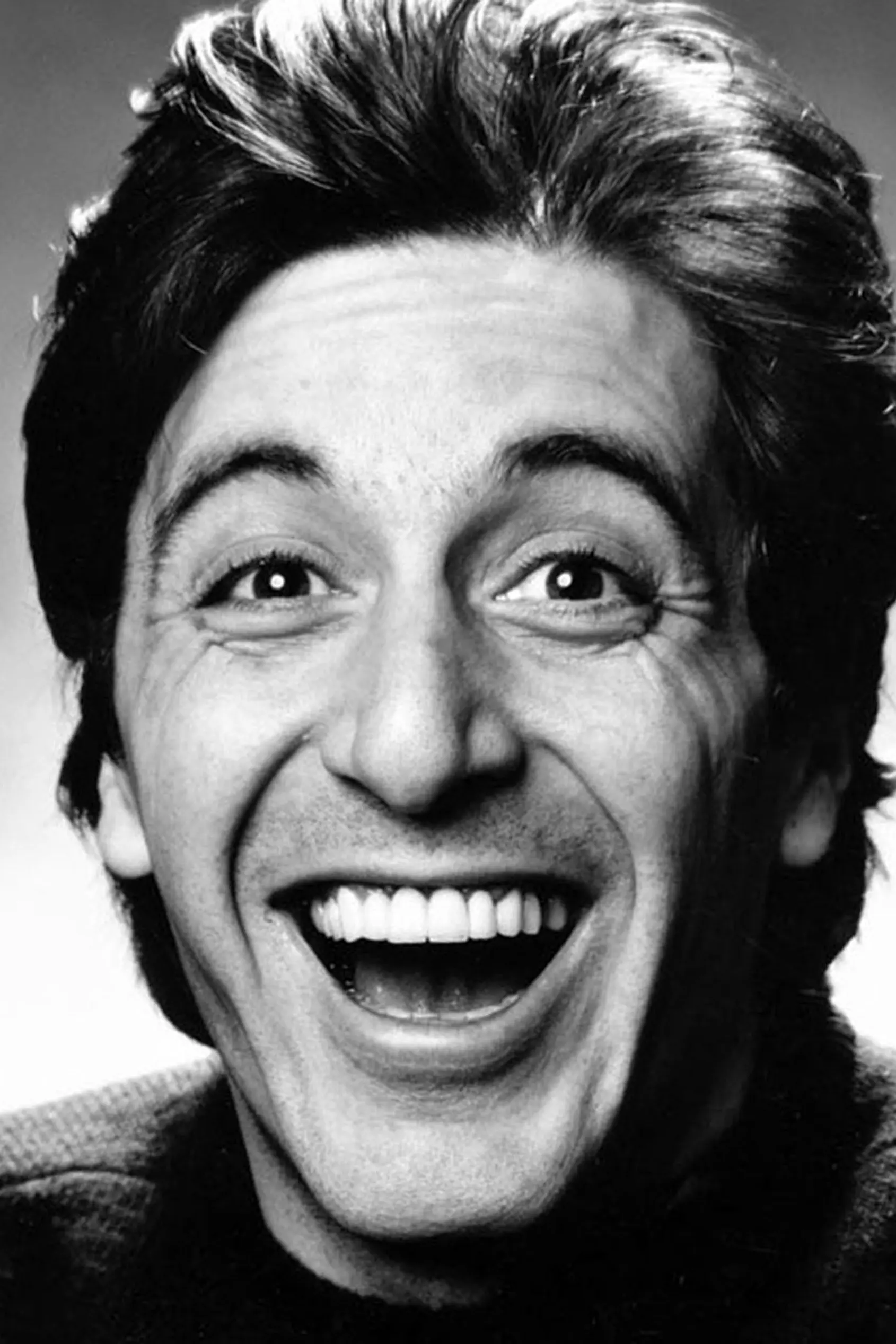 Al Pacino smiling poster showing a close-up black and white portrait of the actor with a wide grin from 1979.