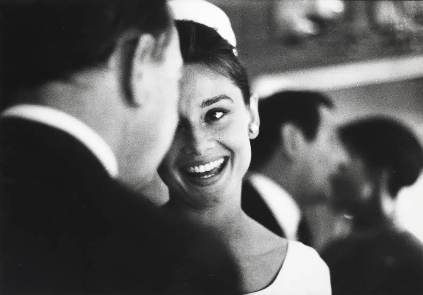 Audrey Hepburn at Sean Hepburn Ferrer print showing at sean hepburn ferrer's christening, 1960 with archival tone