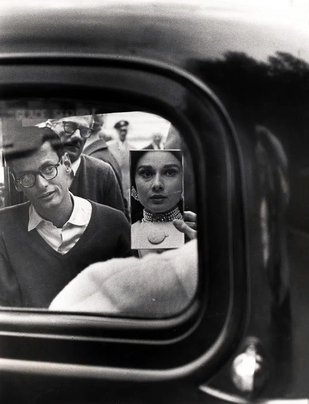 Audrey Hepburn in Car With Mirror print showing in car with mirror, richard avedon looking on with archival tone