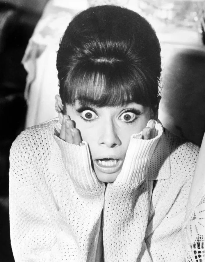 Audrey Hepburn with a surprised expression in a black and white photography print from Paris When It Sizzles.