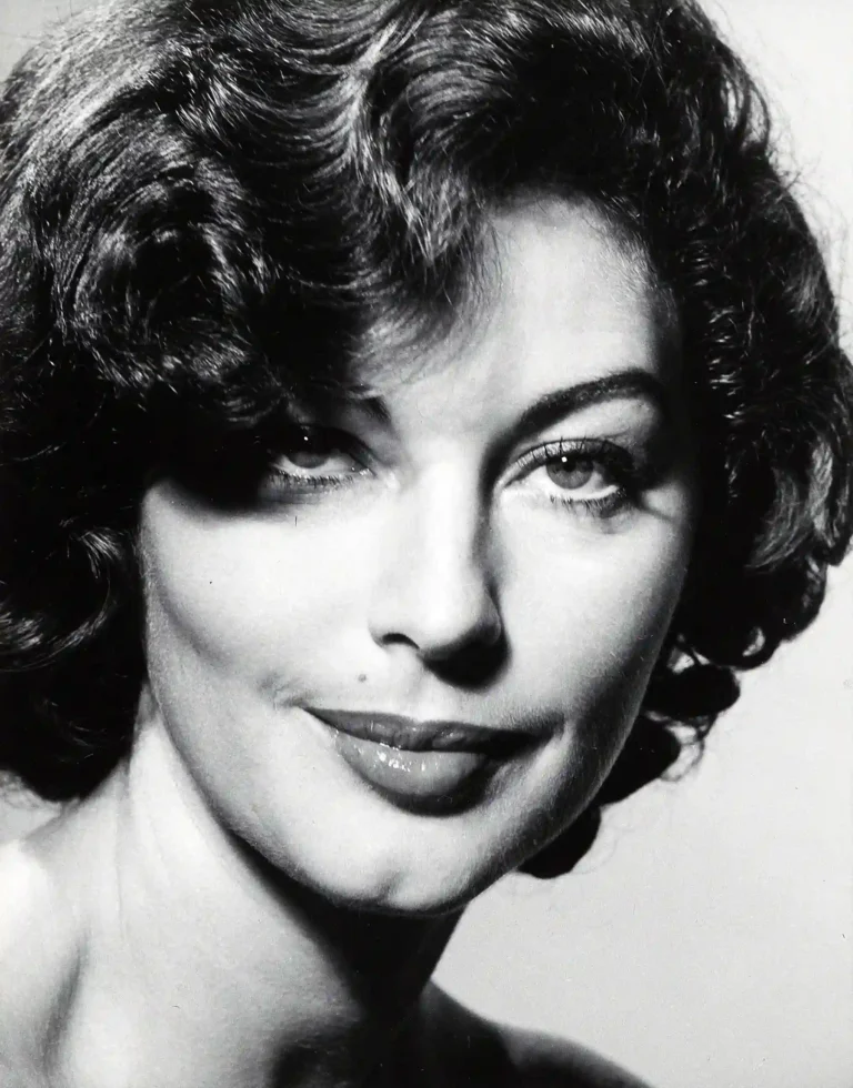 Clean artwork view of Ava Gardner LIFE Magazine Portrait, Black and White Photography Print. A close-up black and white photography portrait of Ava Gardner by Philippe Halsman, featuring her signature wavy hair and a subtle, knowing smile.