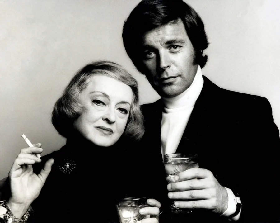 Bette Davis Robert Wagner — sophisticated black and white portrait of Hollywood legends Bette Davis