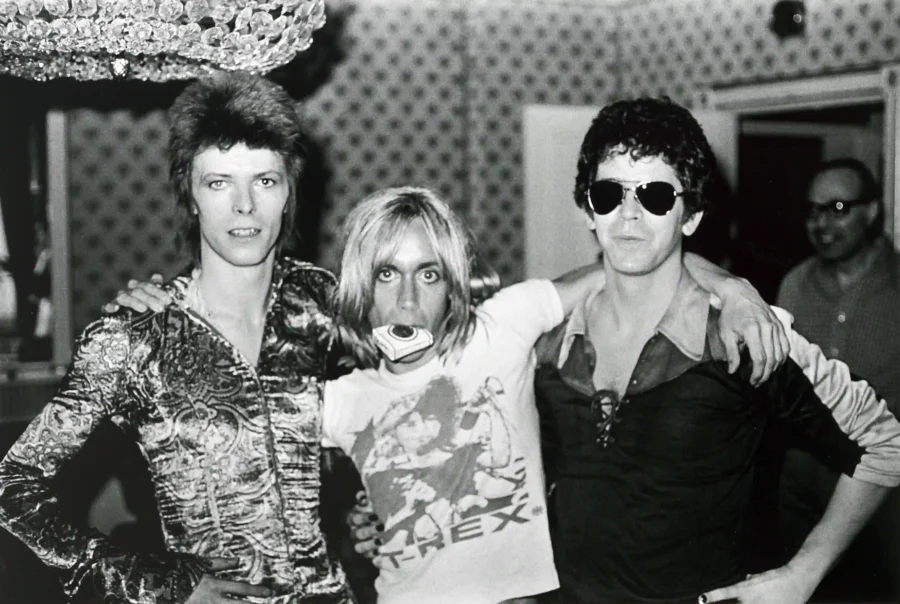 David Bowie Iggy Pop — candid black and white photograph featuring David Bowie, Iggy Pop, and