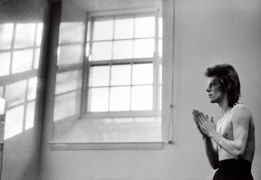 David Bowie Window Prayer — black and white photograph featuring David Bowie in a prayer pose