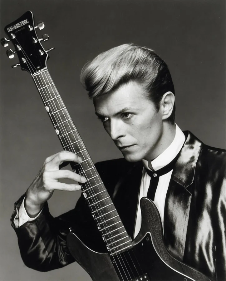David Bowie 1988 Dan — sharp black and white portrait of David Bowie from 1988 holding a Dan