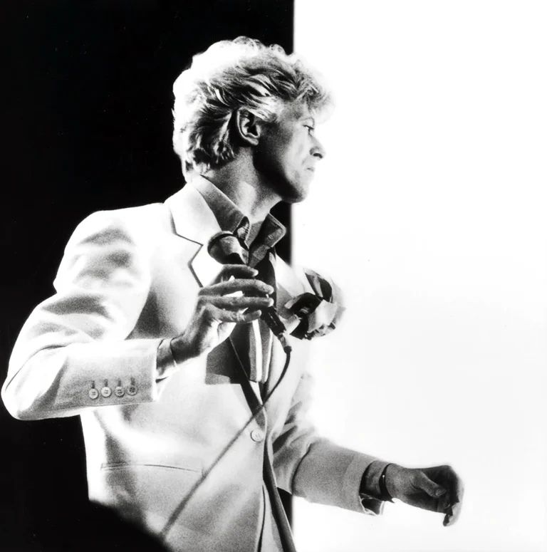 David Bowie Serious Moonlight Tour — high-contrast black and white photograph of David Bowie performing