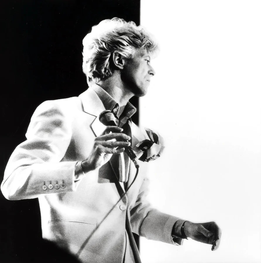 David Bowie Serious Moonlight Tour — high-contrast black and white photograph of David Bowie performing