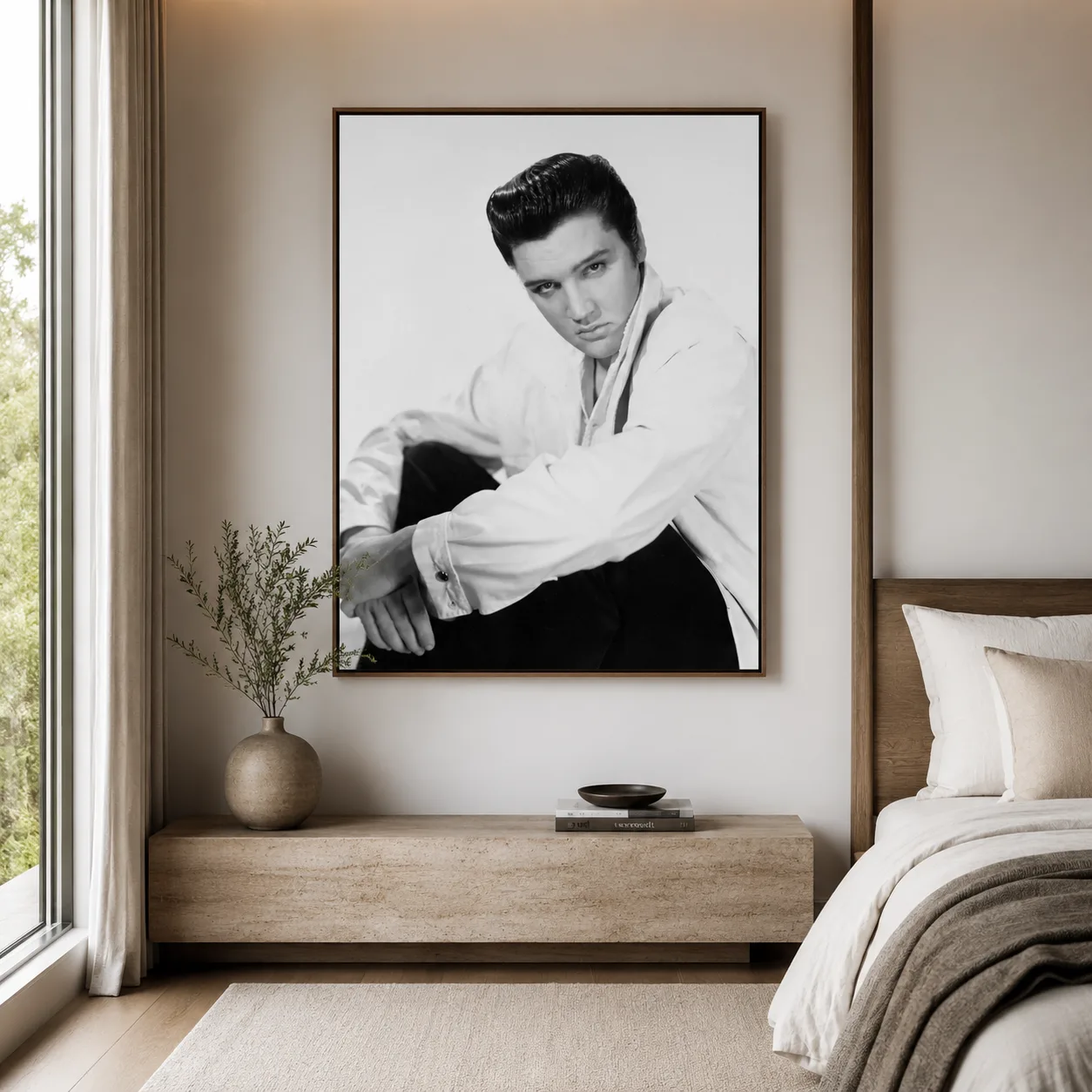 Elvis Presley Paramount — white shirt, seated pose, slick hair, and clean studio contrast give