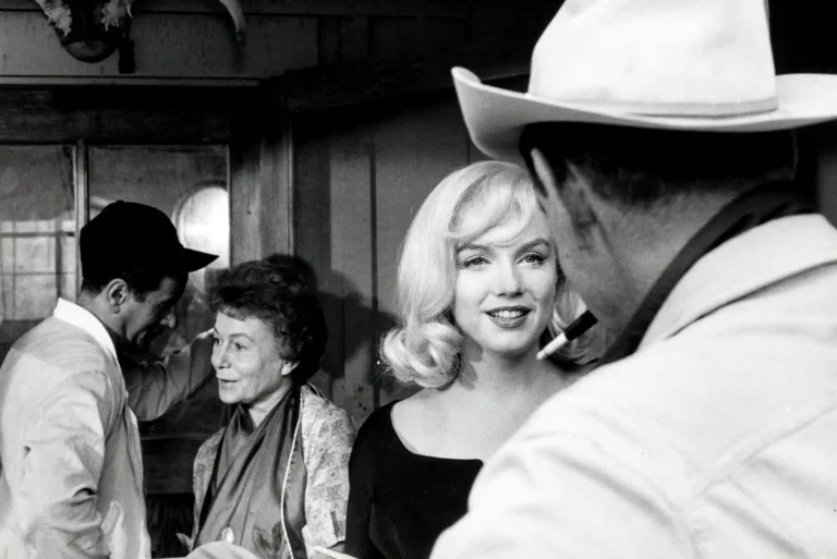 Clean artwork view of The Misfits Cast, Marilyn Monroe and Clark Gable Photography Print. A black and white photograph featuring Marilyn Monroe, Clark Gable, Thelma Ritter, and Eli Wallach in a candid scene from the 1961 film The Misfits.