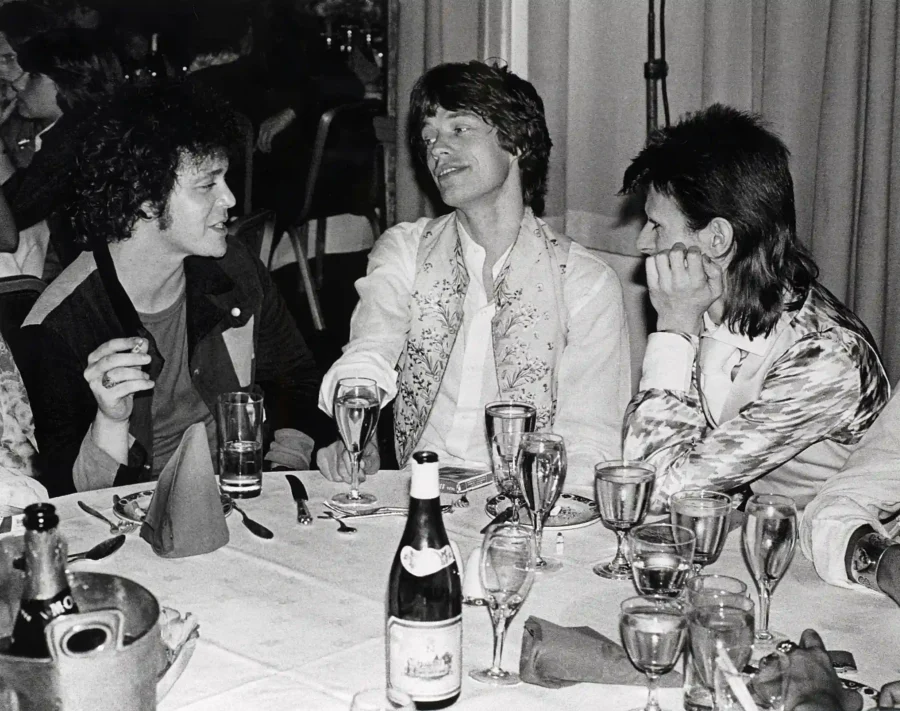 David Bowie — candid black and white photograph featuring Lou Reed, Mick Jagger, and