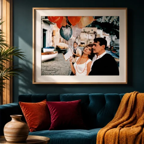 A framed art print of Sophia Loren and Clark Gable in Naples displayed on a stylish gallery wall.